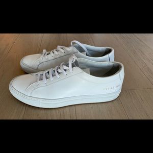 Rubber sole measures approximately 25mm/ 1 inch, White leather.  Excellent cond